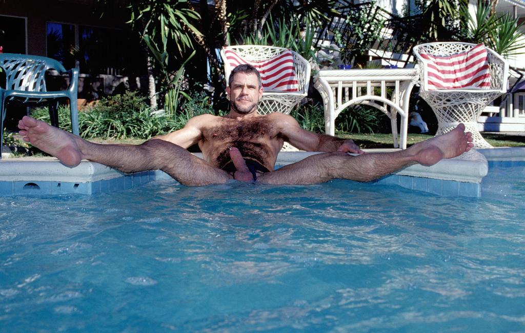 Hairy Gay Bear Moves His Swimming Trunks Aside To Expose His...